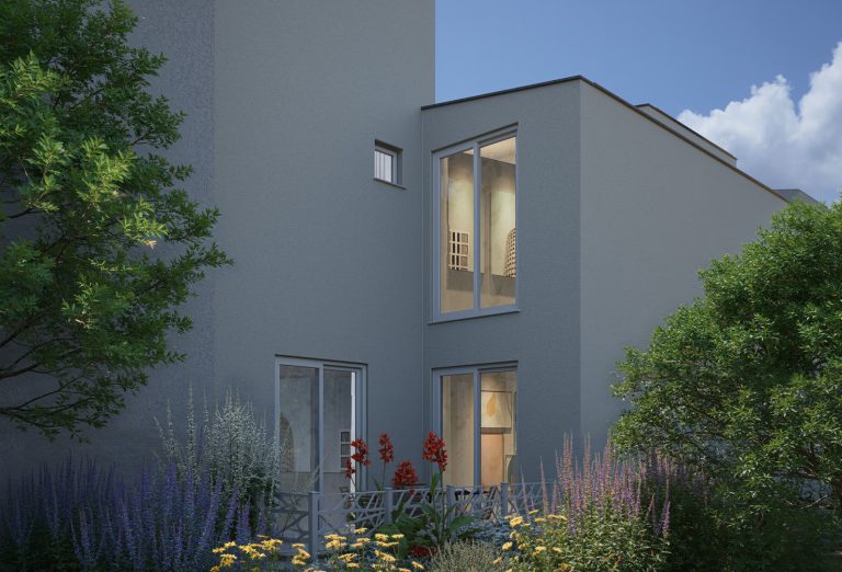 Athena Residence: rear facade at dusk with lit tall windows behind a garden of lavender and red flowers