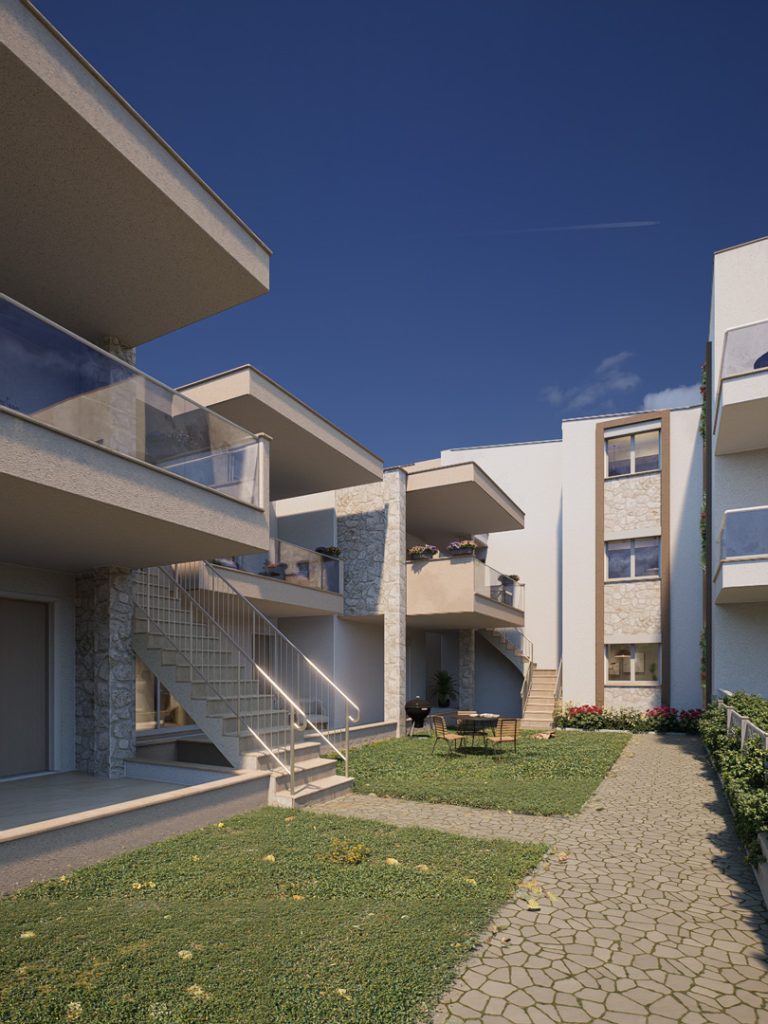 Gardenia 3 inner courtyard in daylight with outdoor stairs, stone piers, lawn and stone-paved path