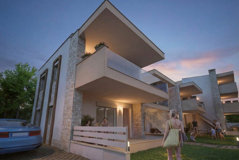 Gardenia 3 low corner view at dusk, stone piers and cantilevered balconies with residents in the garden