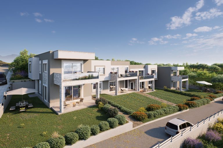 Sikia Vista elevated view of the terraced houses and private gardens on a sunny day, street and parked car in front