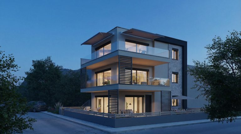 Keli Residence corner three-quarter view at blue hour with lit interiors, louvered screens and terraces