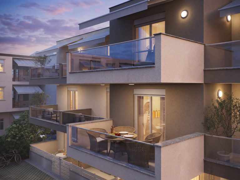 Catherina Residence corner balcony at dusk, wicker dining set and warm light from the living room
