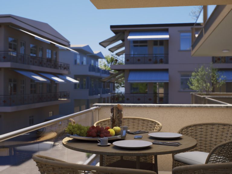 Catherina Residence balcony table set with fruit and coffee, daylight view of the neighboring apartment blocks