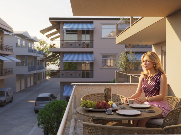 Catherina Residence balcony at golden hour, woman in a polka-dot top having coffee at the breakfast table