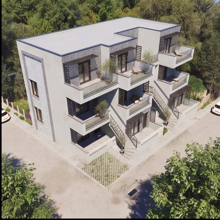 Nika 2 Residence: high aerial corner view in daylight showing flat roof, terraces and stairs among trees