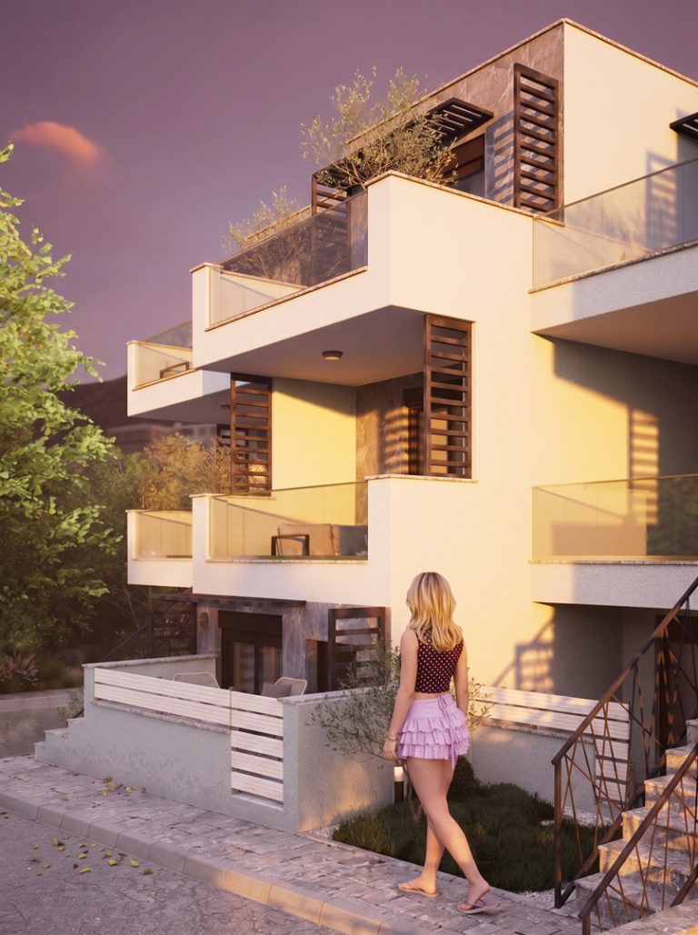 Nika 2 Residence: side view at golden hour with a woman in a pink skirt walking past the front garden