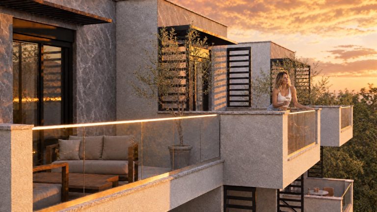 Woman enjoying wine on the rooftop lounge at golden hour
