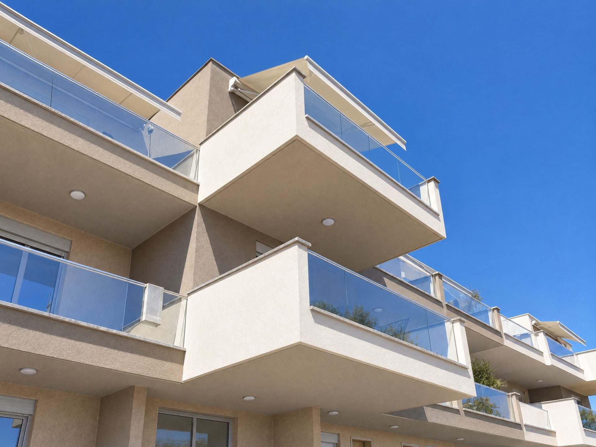 Cantilevered balconies with glass balustrades under high midday sun, Catherina Residence
