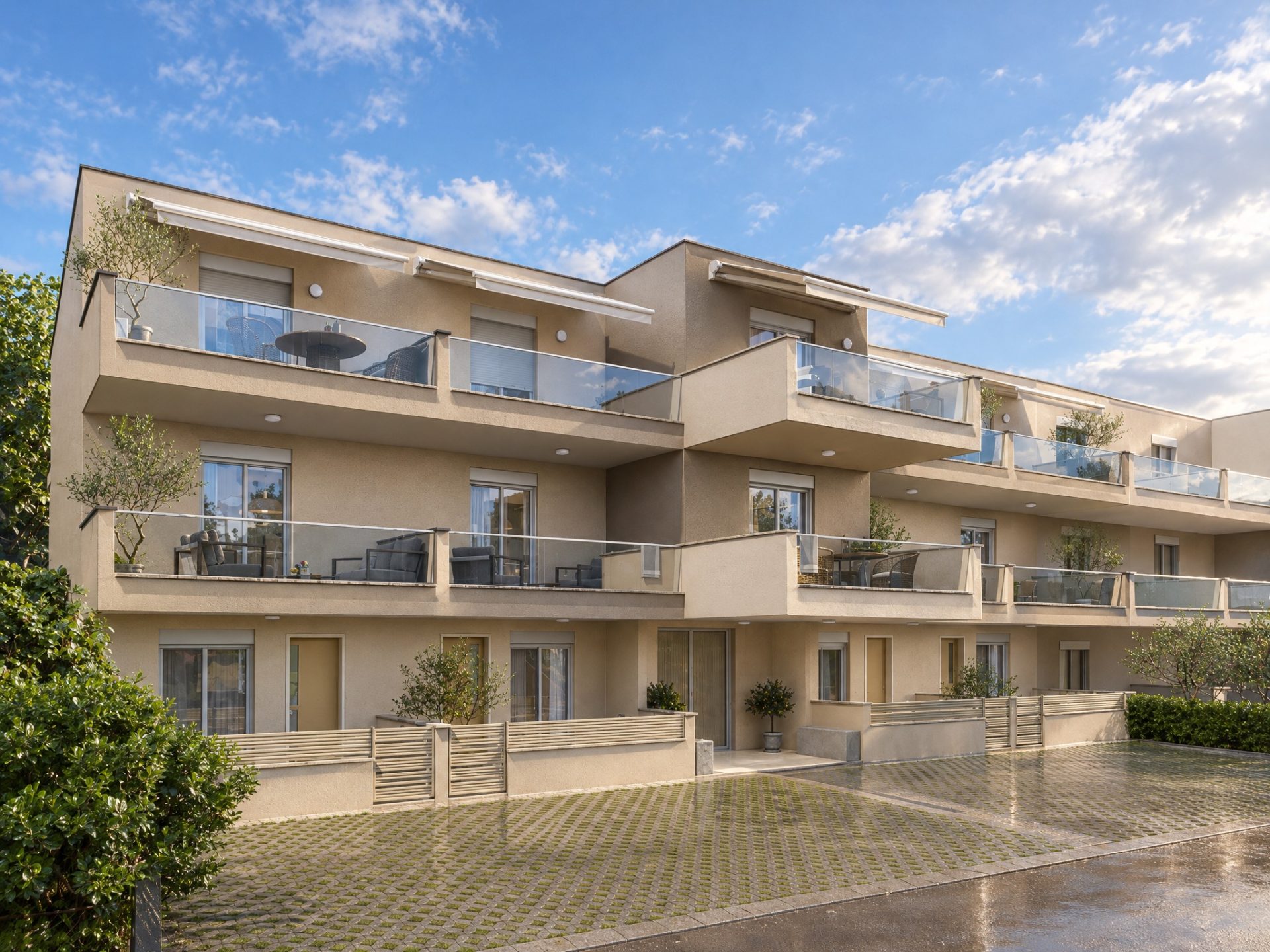 Catherina Residence long facade after a summer shower, damp paving and breaking clouds