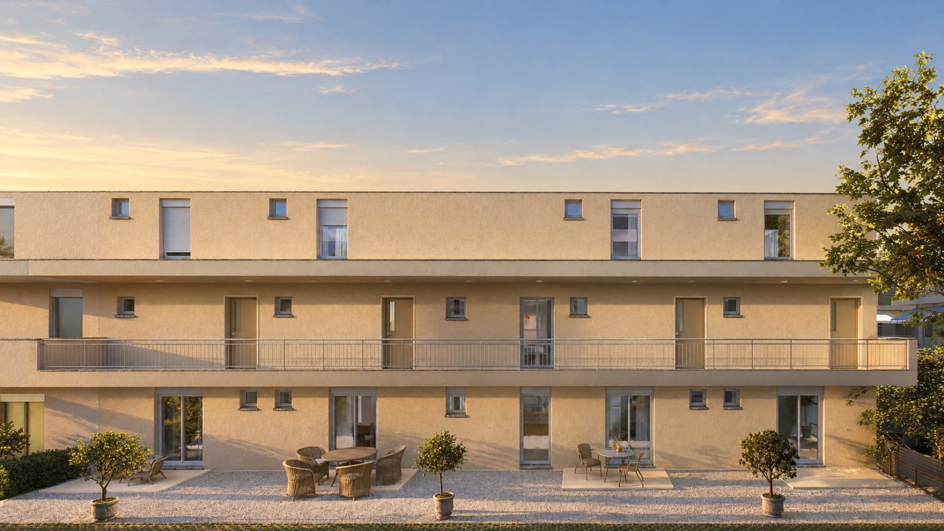 Catherina Residence rear facade and courtyard in raking golden-hour light