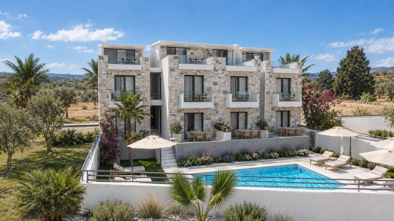 Nea 2 Residence stone-clad pool elevation in midday sun