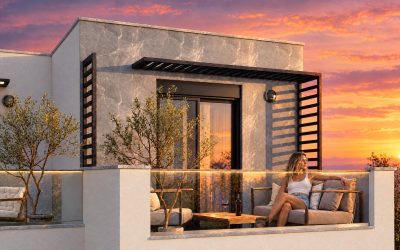 Woman relaxing on the Nika 2 Residence roof terrace at sunset