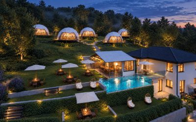 Whole glamping site at blue hour: five lit domes on the slope, pavilion, pool and guesthouse