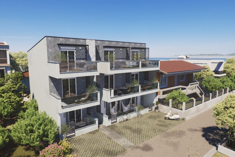 Elevated three-quarter view of Sia 2 Residence with the sea beyond