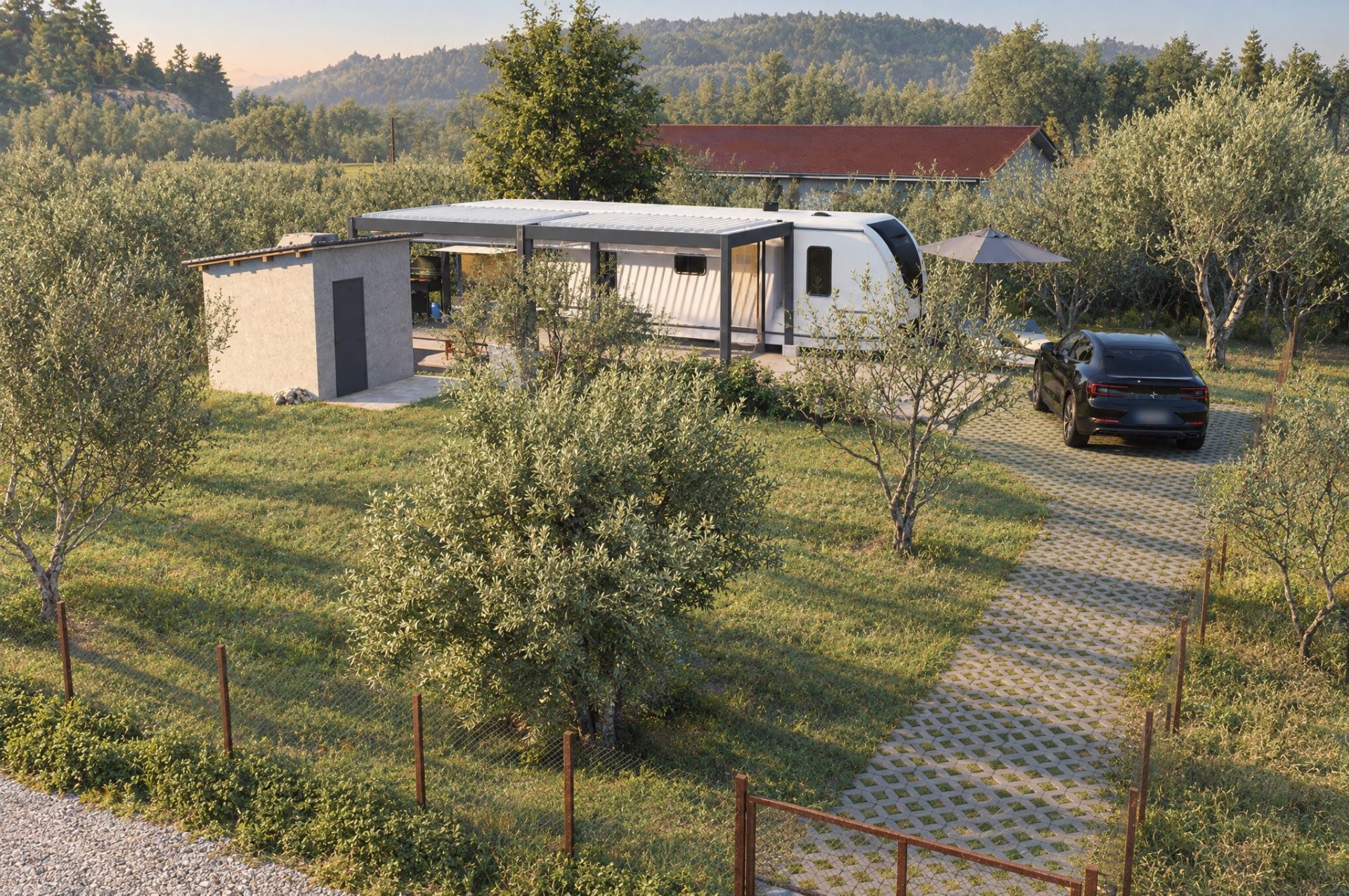 Aerial morning view of the Toroni camper plot: gate, grass-paver drive, olive trees, utility shed and camper under its louvred pergola