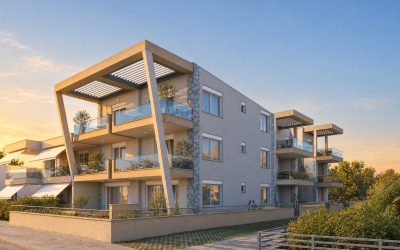 Via Mare Residence street corner at golden hour, angled pergola frame and stone columns in low warm sun